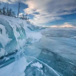 The frozen lake Torneträsk in Swedish Lapland. Beautiful ice forms create an amazing sight.